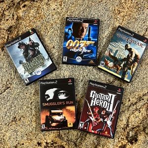 PS2 games Medal Honor, Smuggler Run, God War, Guitar Hero, 007 Nightfire